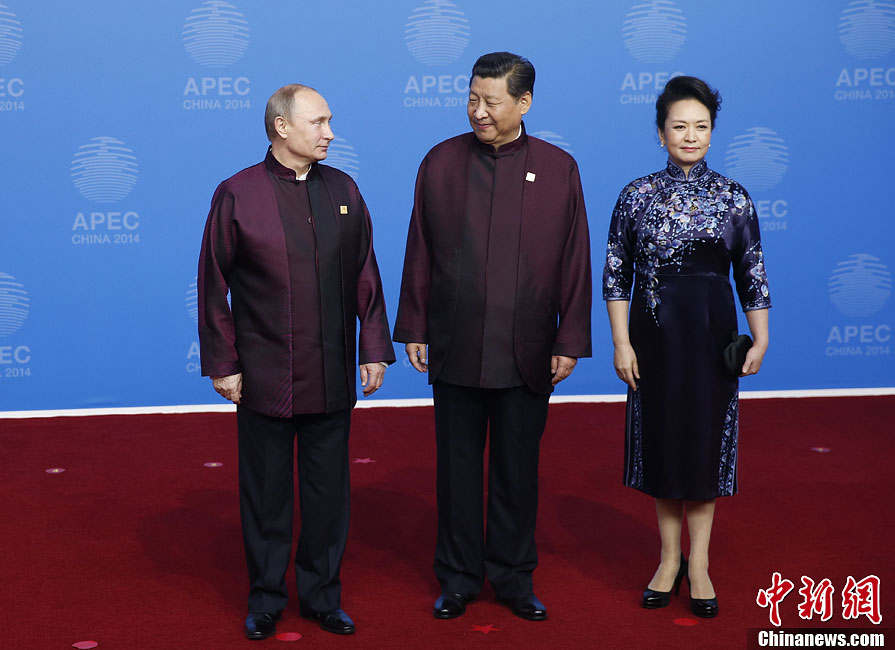 圖為習(xí)近平夫婦歡迎俄羅斯總統(tǒng)普京。中新社發(fā) 杜洋 攝